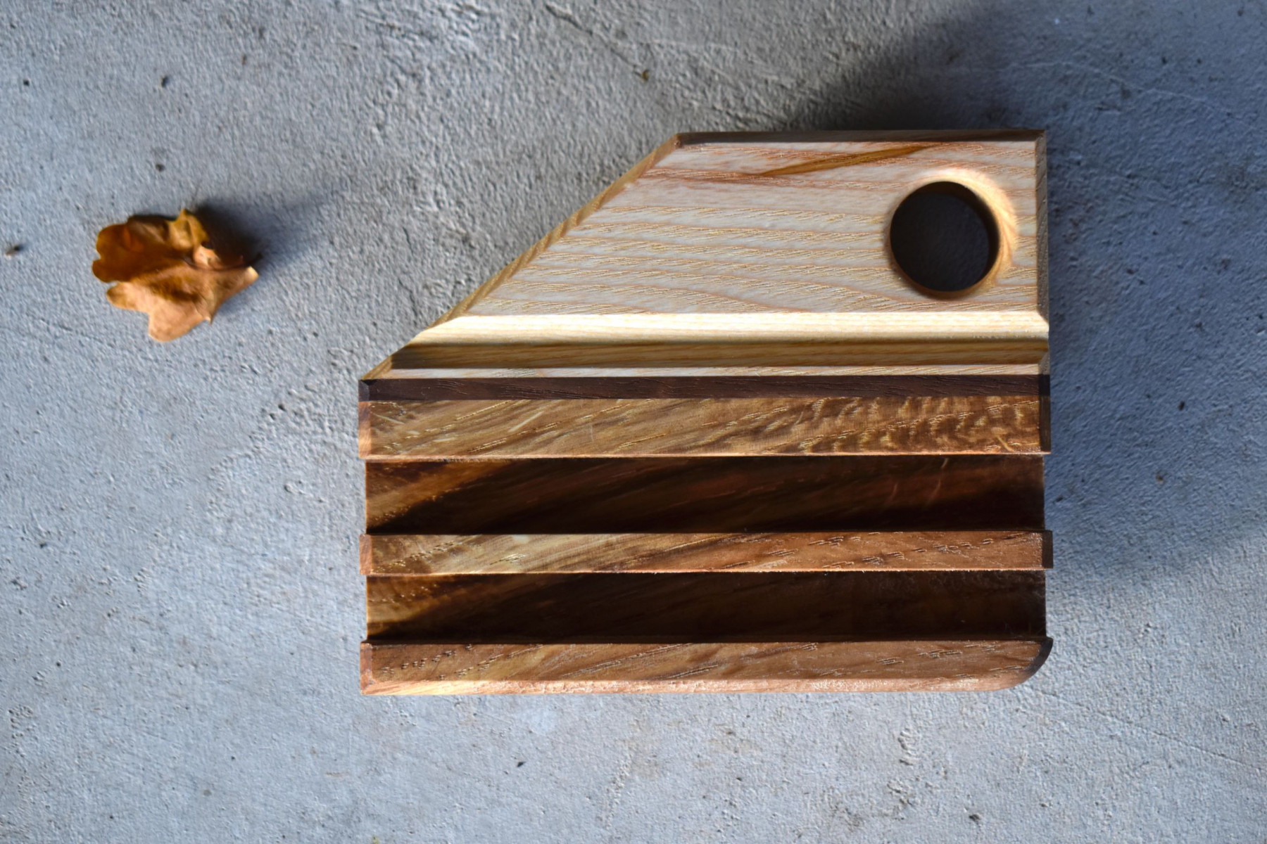 Device holder: oak, ash & a black walnut strip