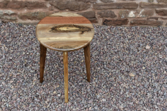 Walnut, sapele and elm circular side-table